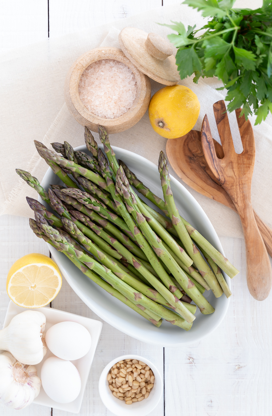 Asparagus overhead with kitchen ingredients — Green Kitchen