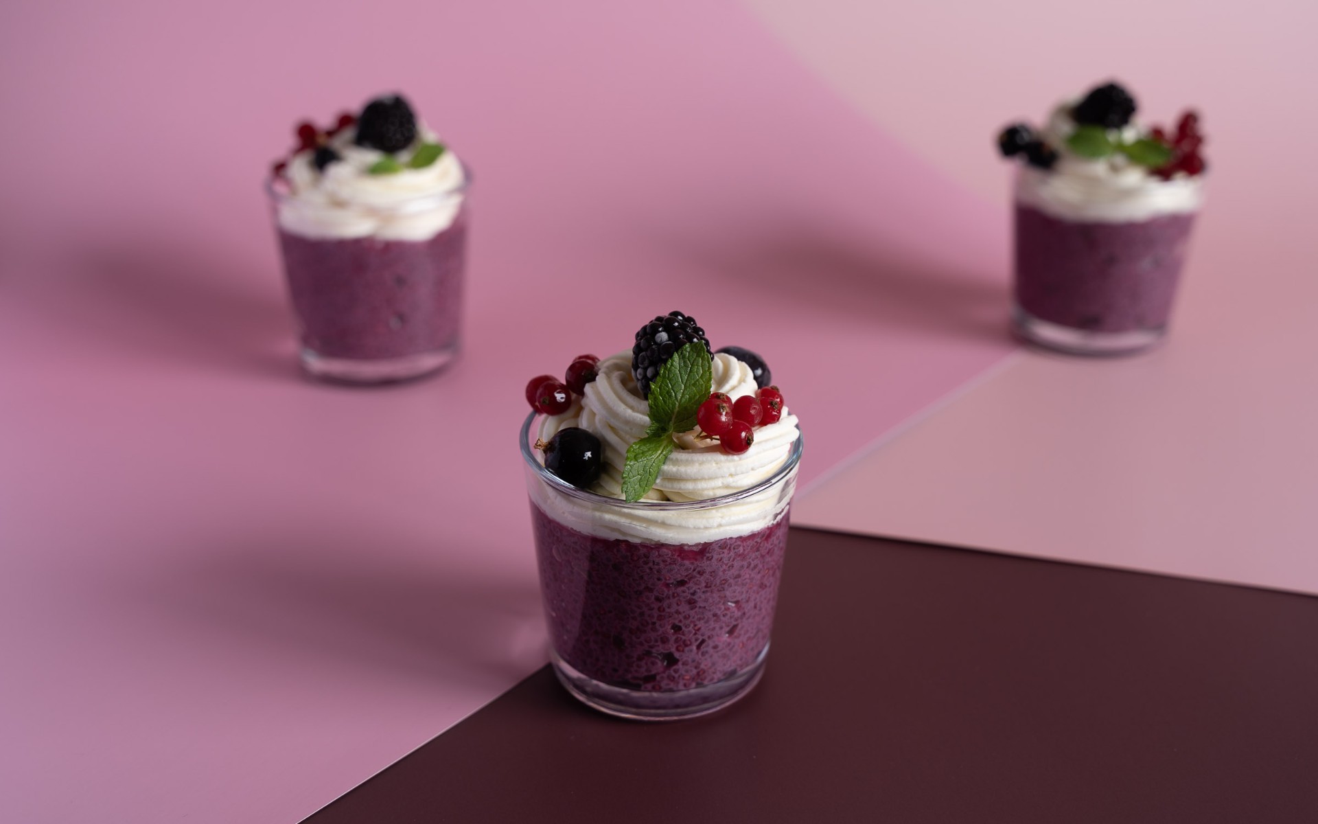 Berry parfait glass on pink — Pancakes, Waffles & Berries