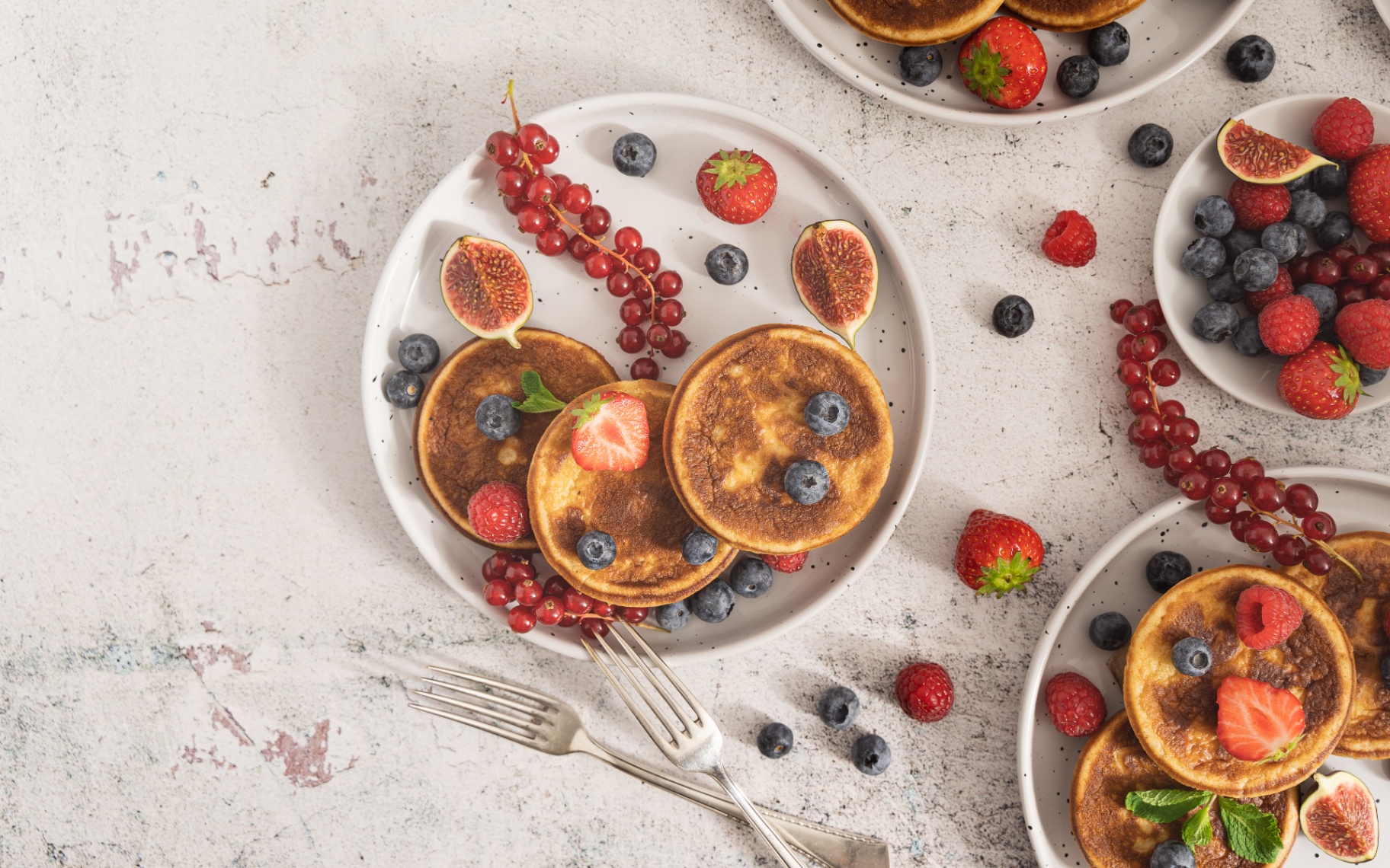 Pancakes with scattered berries — Pancakes & Berries