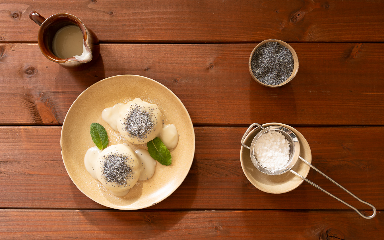 Two dumplings on plate — Poppy Seed Dumplings